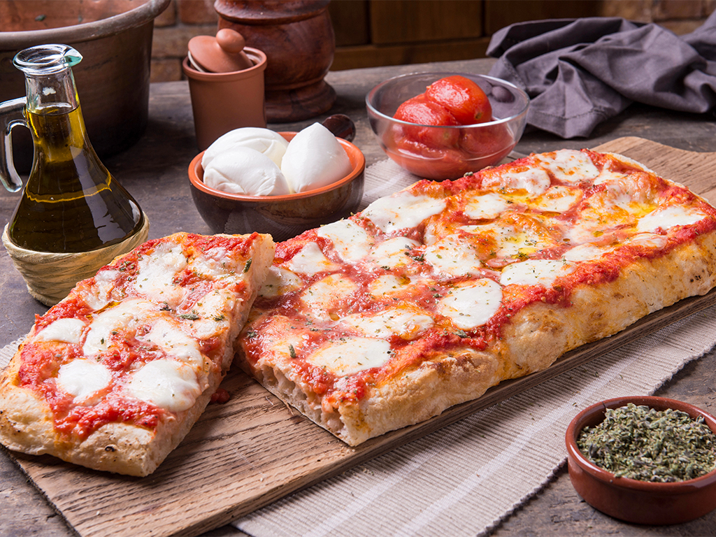 Quesos en la pizza más allá de la mozzarella